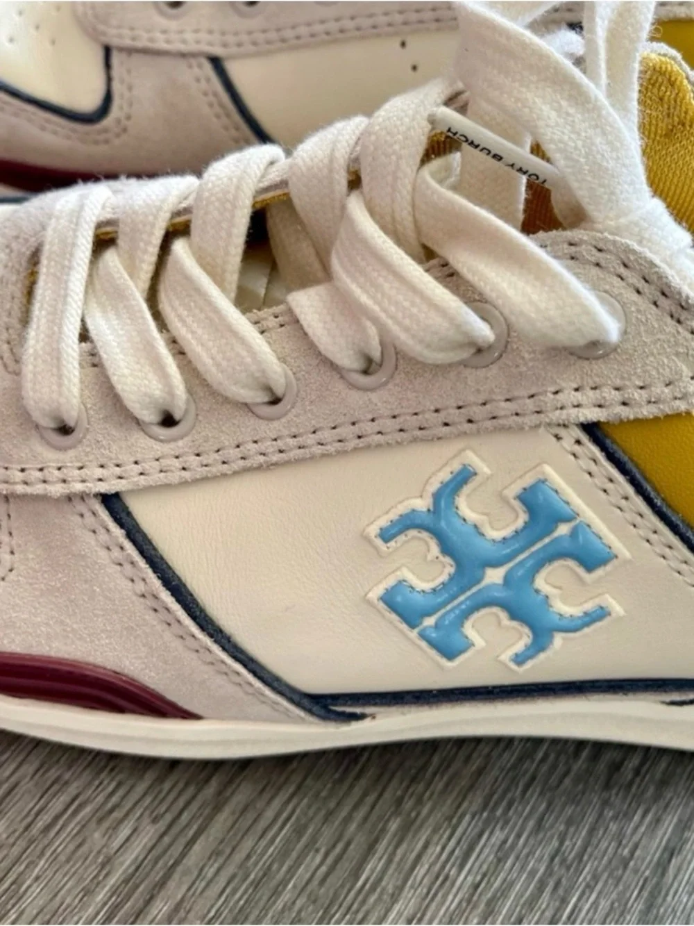 Tory Burch White Leather Sneaker with Light Blue Logo & Yellow Accent